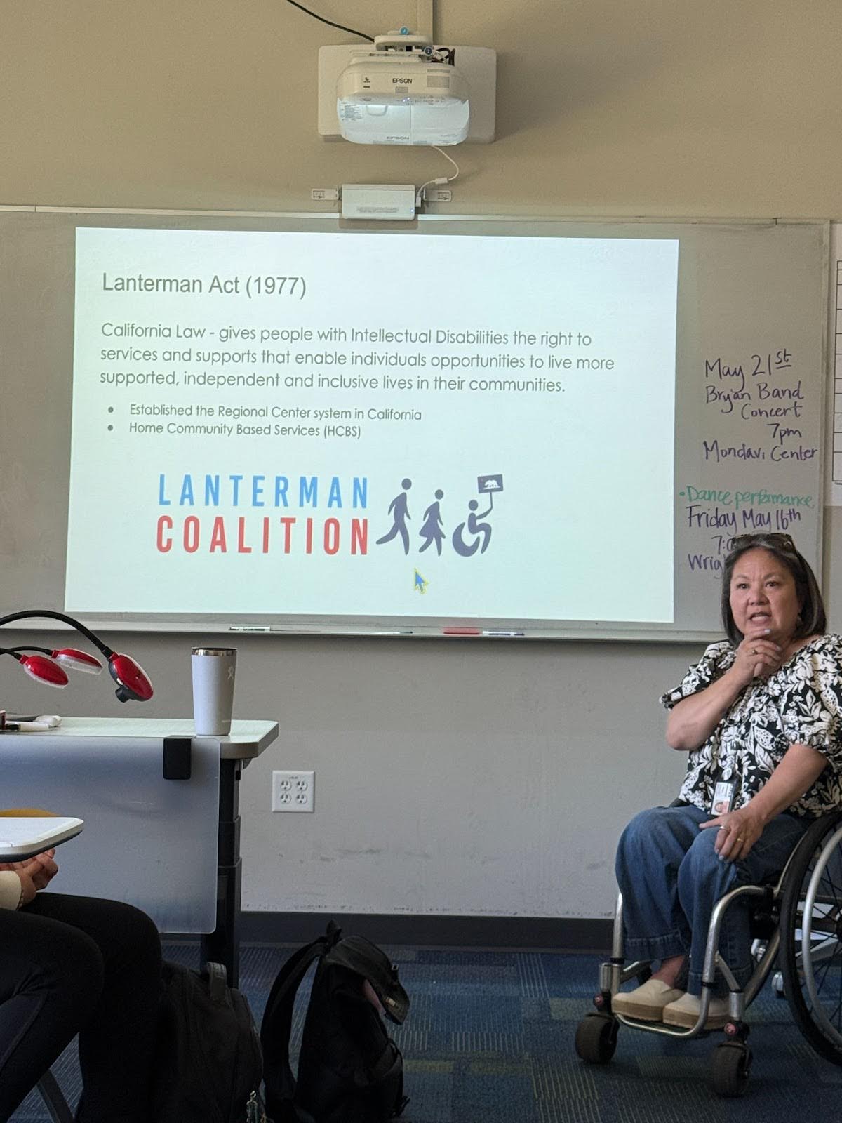 professor in wheelchair teaching a class