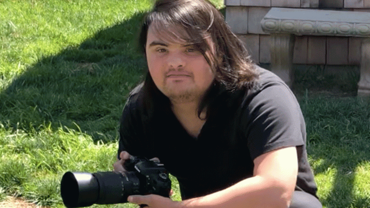 ryan fitch posing with his camera