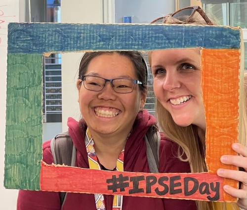 student and mentor pose for picture on IPSE Day