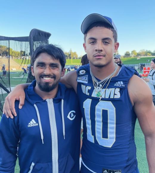 student with uc davis football player