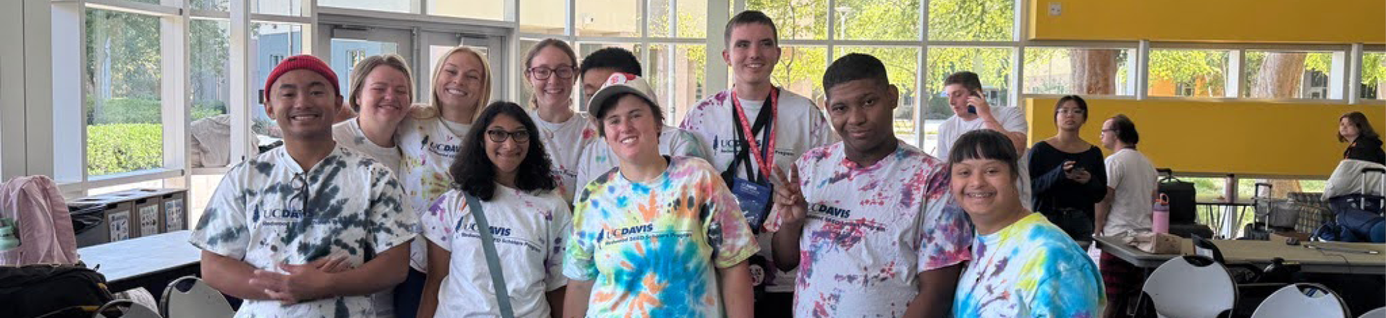 group of students wearing tye dyed t-shirts